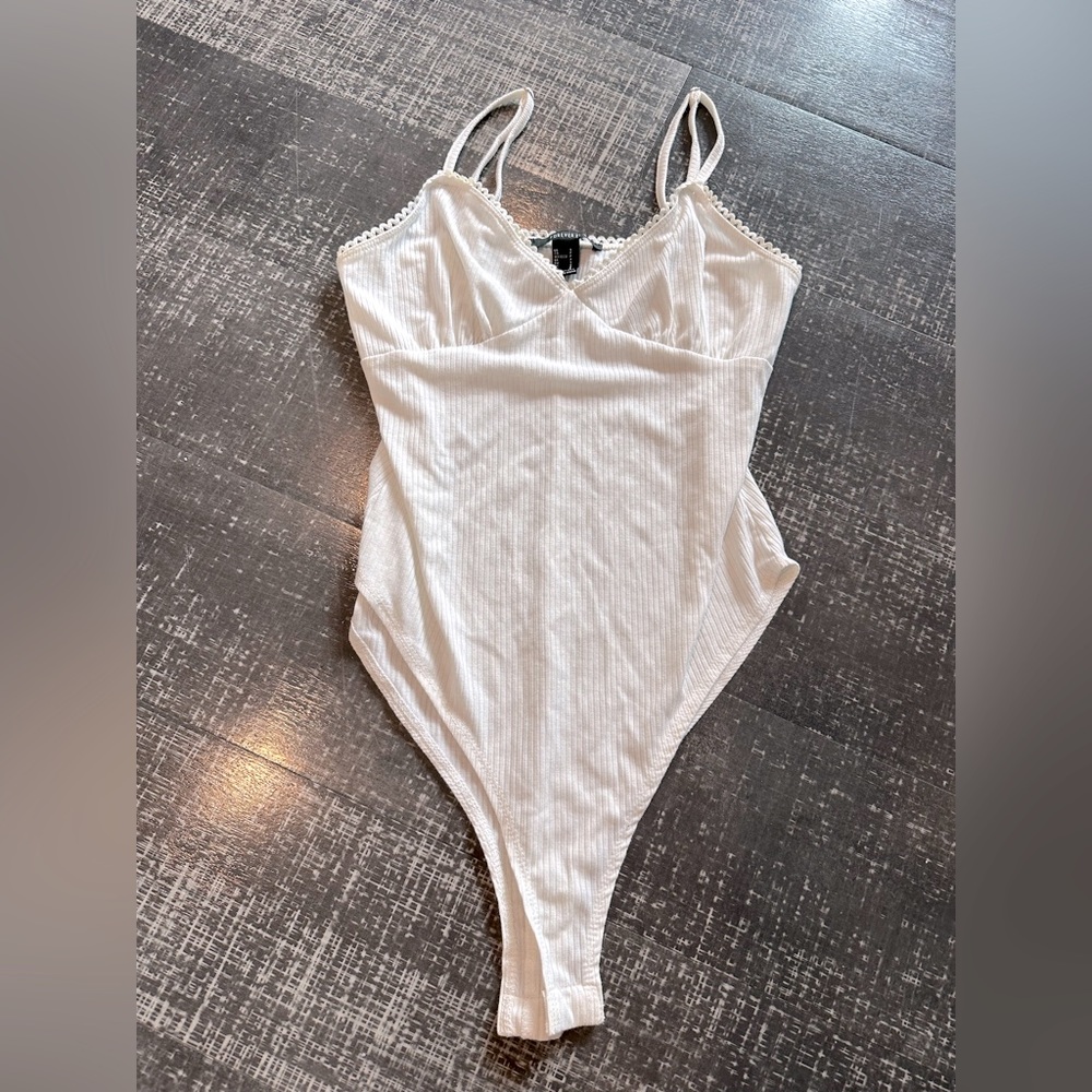 White ribbed bodysuit size S.